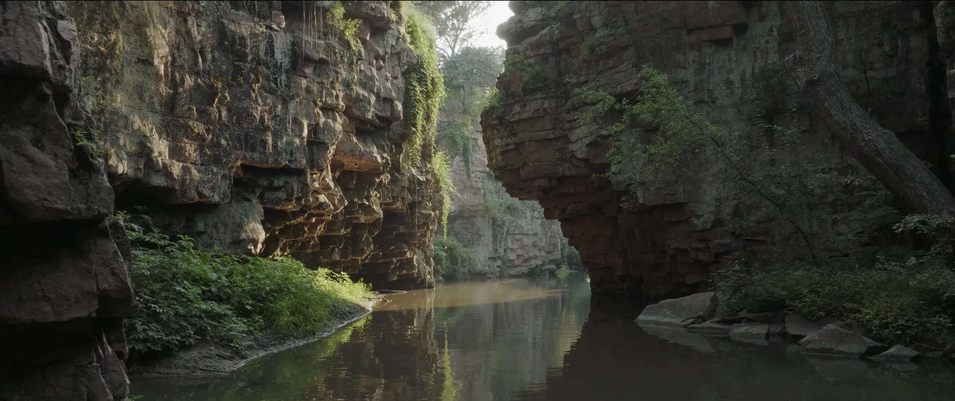 A river running through a rock canyon